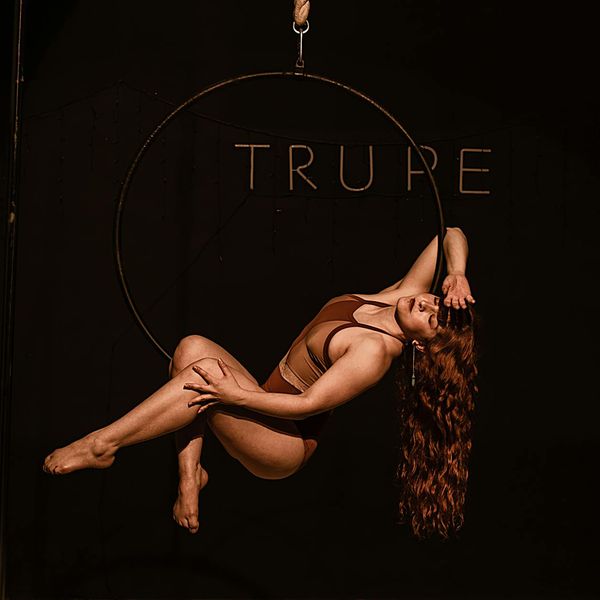 Athlete in a dynamic lunge showcasing strength and flexibility.